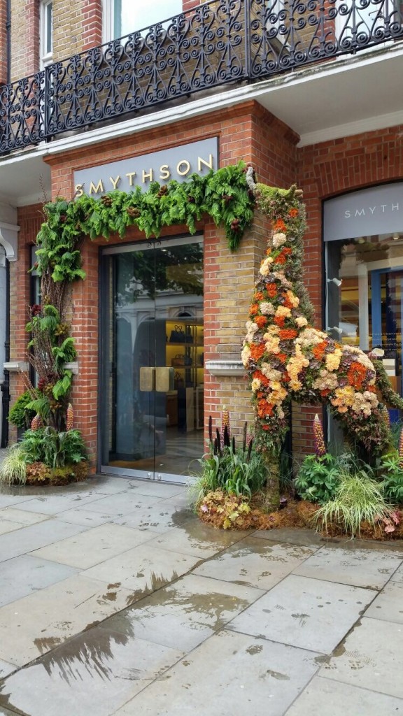 Tall floral topiary giraffe outside Smythson for Chelsea in Bloom